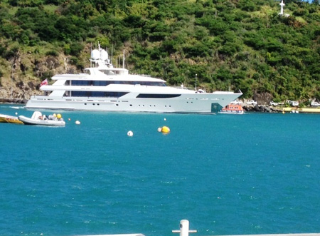 A yacht sails into Gustavia Harbor to find its berth